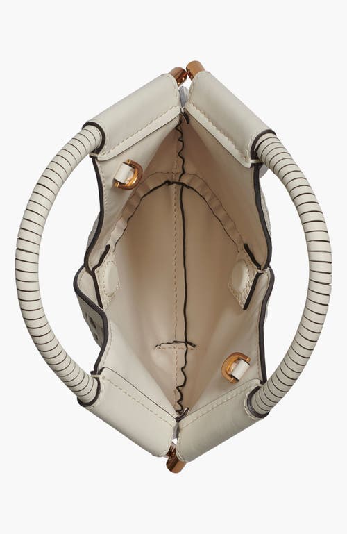 Donna Karan New York Baldwin Woven Grommet Micro Crossbody In Brown