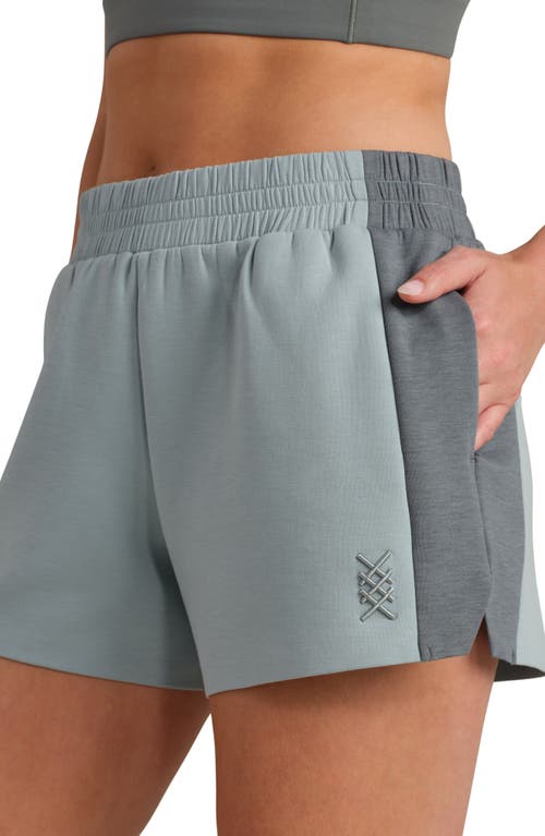 Rhone Dreamglow Color Blocked Shorts In Green