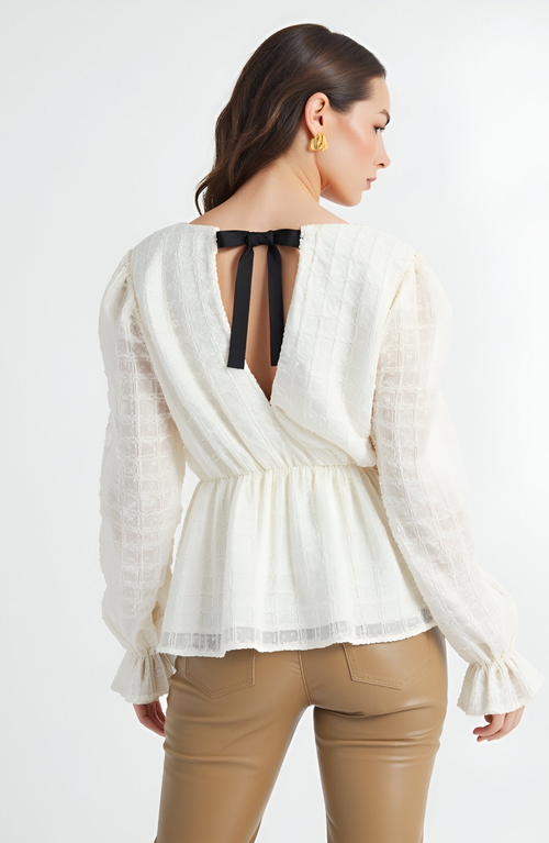 Modenaire Textured Long Sleeve Blouse With Peplum Hem And Back Bow Tie In White