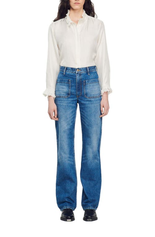 Sandro Flared Faded Jeans In Blue Jean