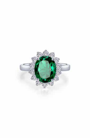 Sunburst Oval Simulated Emerald & Simulated Diamond Halo Ring