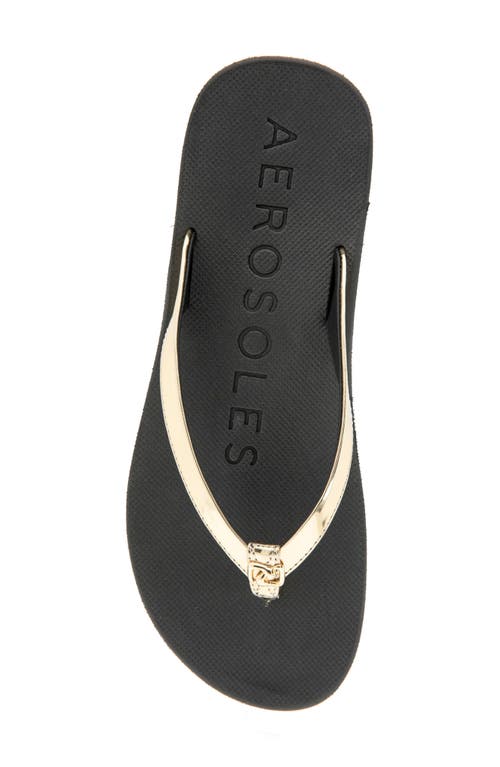 Shop Aerosoles Jace Flip Flop In Gold Mirror/black