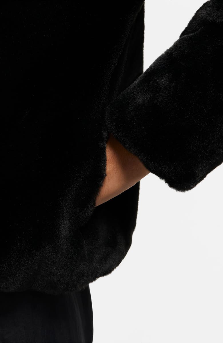 swoosh faux fur jacket