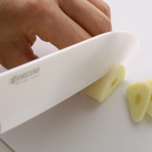 Kyocera Revolution Ceramic 5-1/2 Inch Santoku Knife In White