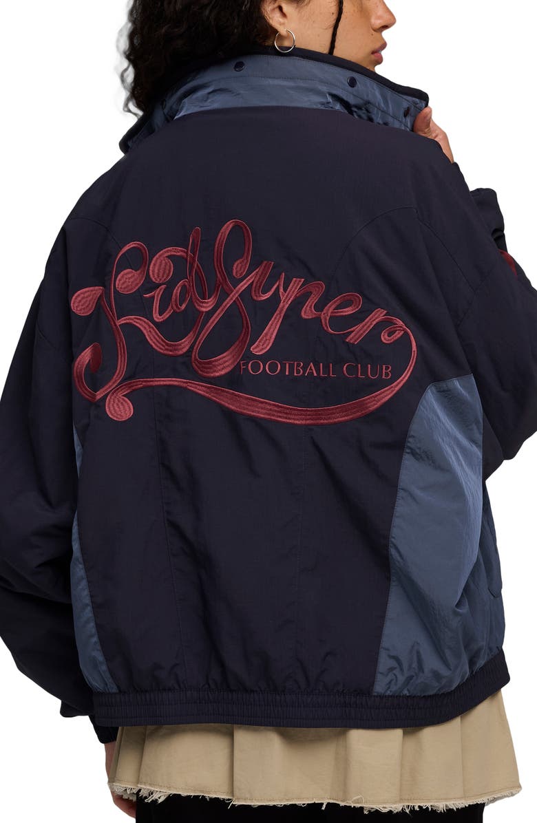 PUMA x KidSuper Hooded Nylon Windbreaker, Alternate, color, New Navy