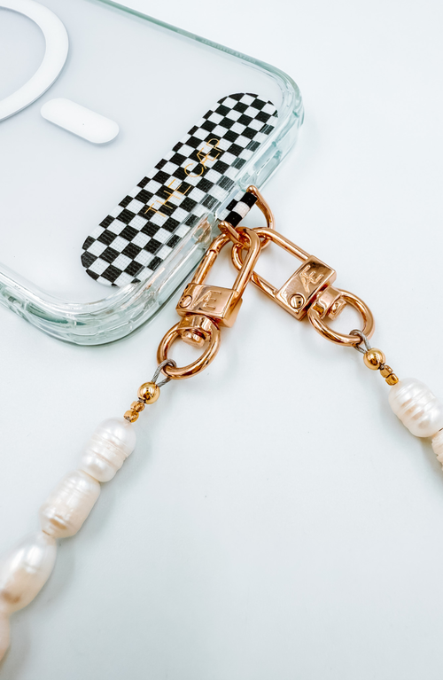 The Cæp Universal Wristlet In White