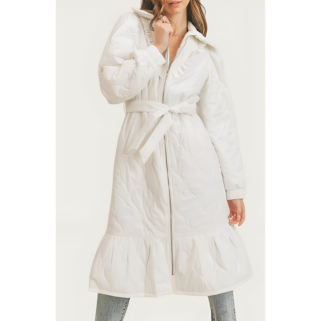 Modenaire Quilted Longline Coat With Ruffle Trim And Tie Waist Belt In White