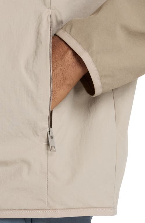 New Balance Athletics Woven Nylon Hooded Jacket In Neutral