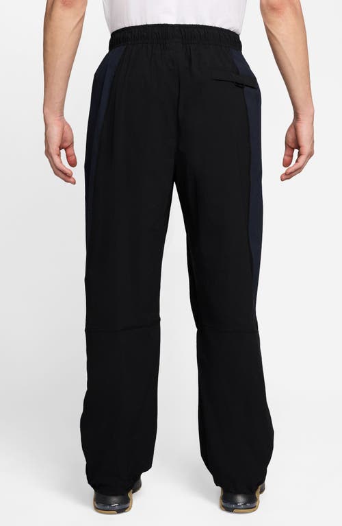 Nike Tech Dri-fit Woven Oversize Stretch Nylon Pants In Black