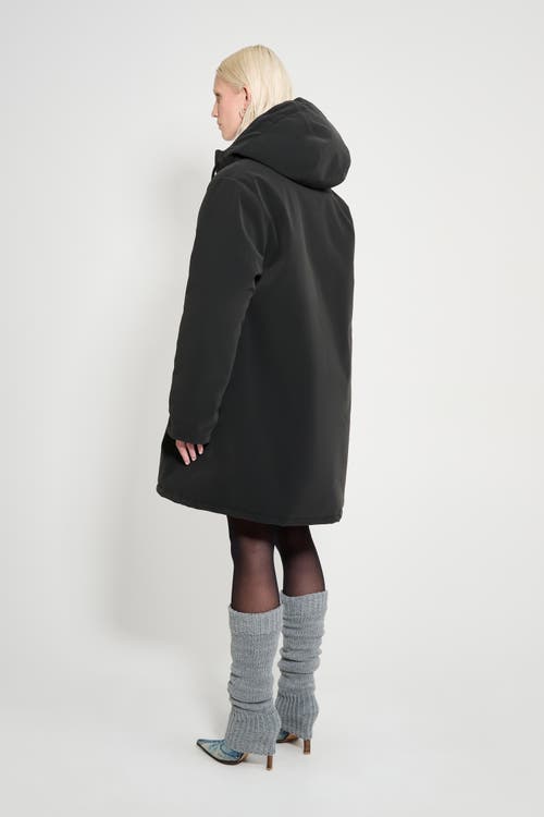 Stutterheim Mosebacke Matte Winter Coat In Black