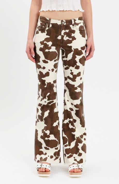 Lowkey Cow Print Flare Jeans