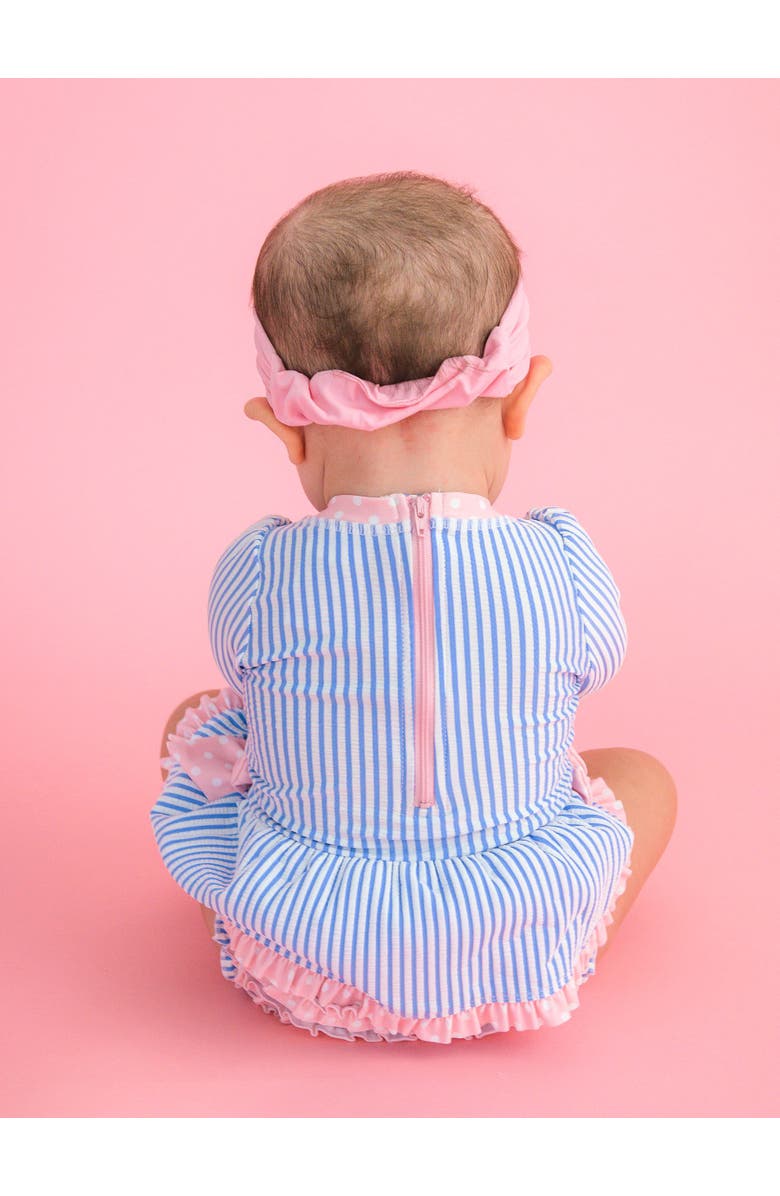 RuffleButts UPF50+ Seersucker Long Sleeve One Piece Bow Peplum Rash Guard Swimsuit, Alternate, color, Periwinkle Blue Seersucker