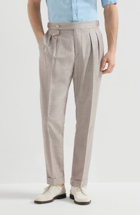 Trousers with double pleats and tabs