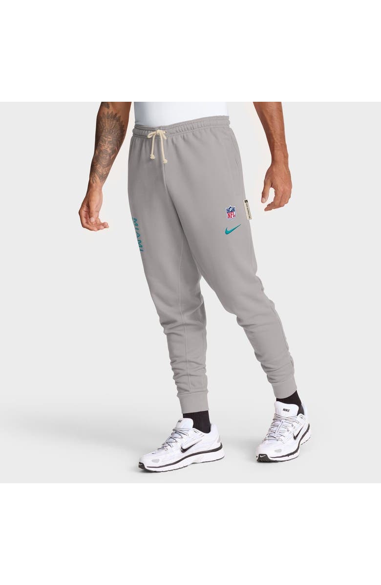 Nike Men's Nike Gray Miami Dolphins Sideline Standard Issue Ground Game Dri-FIT Taper Pants, Alternate, color, Gray