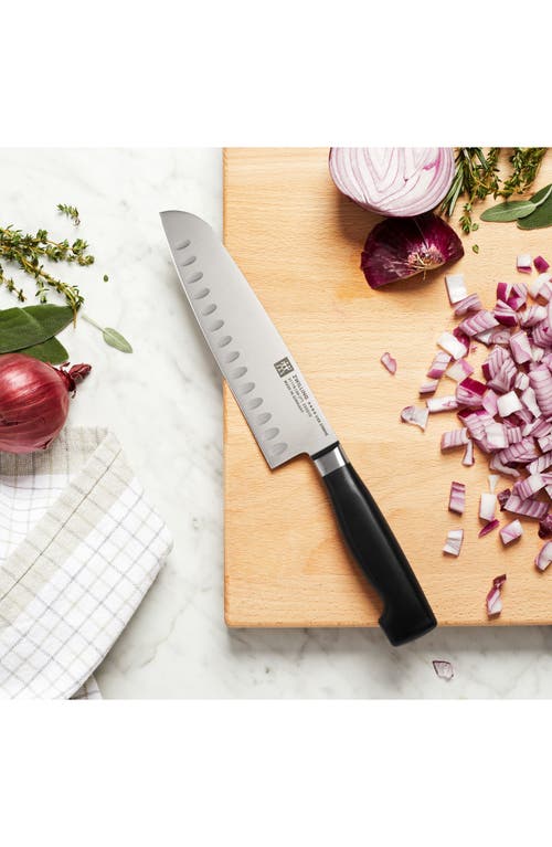 Zwilling Four Star 7-inch Hollow Edge Santoku Knife