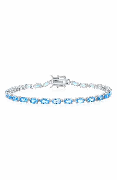 SIMONA Sterling Silver Oval Blue Topaz Tennis Bracelet