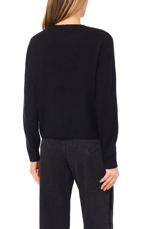 Cece Crystal Bow Embellished Crewneck Sweater In Black