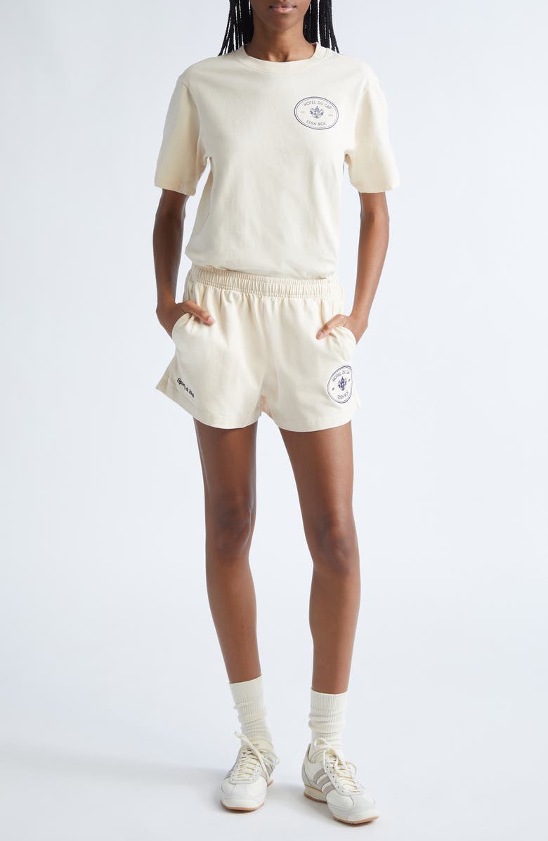 Sporty & Rich Kennedy Crest Cotton Graphic T-Shirt, Alternate, color, Cream