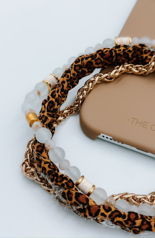 The Cæp Universal Wristlet In Brown