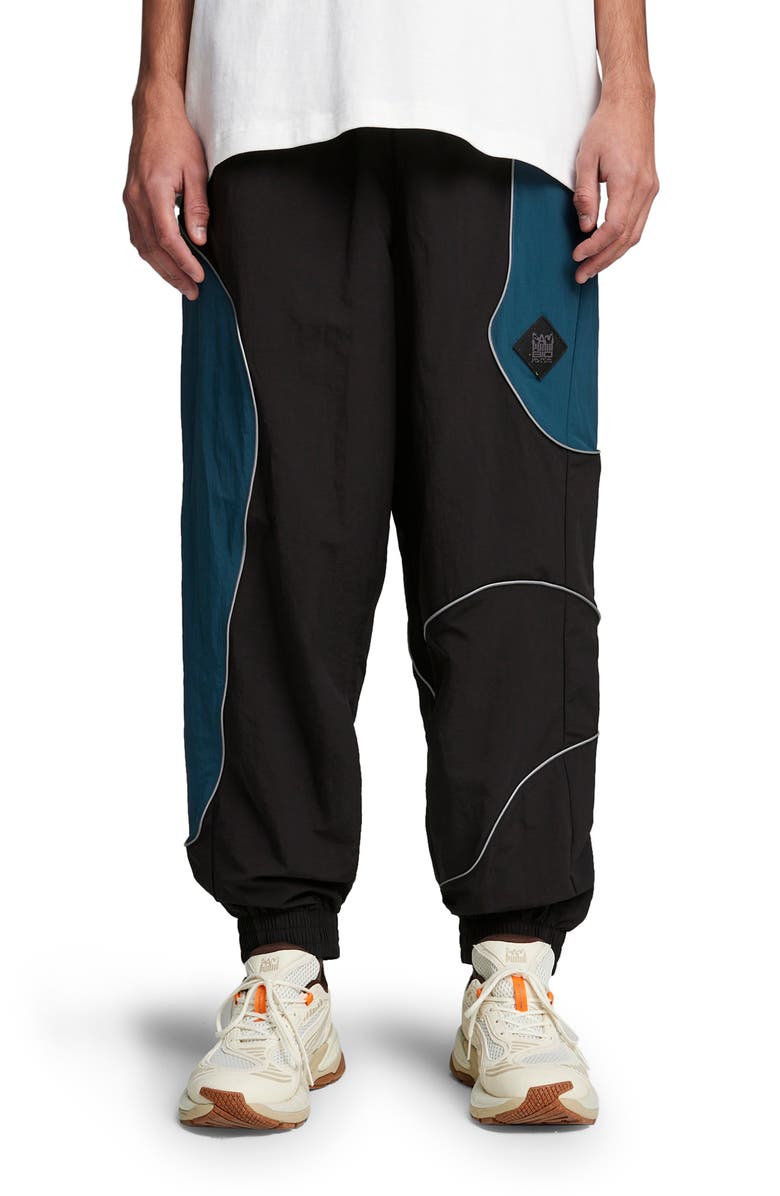 PUMA X P.A.M. Cellerator Water Repellent Track Pants, Main, color,