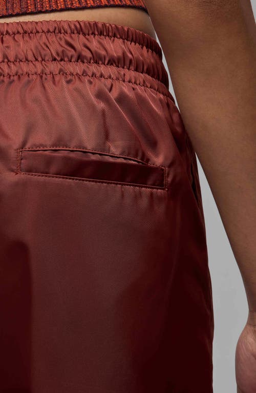 Shop Jordan Brooklyn Water Repellent Pants In Dark Pony/black