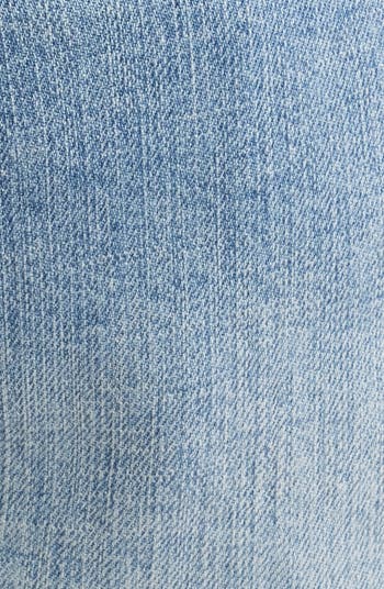 Ripped Knee Blowout Slim Jeans