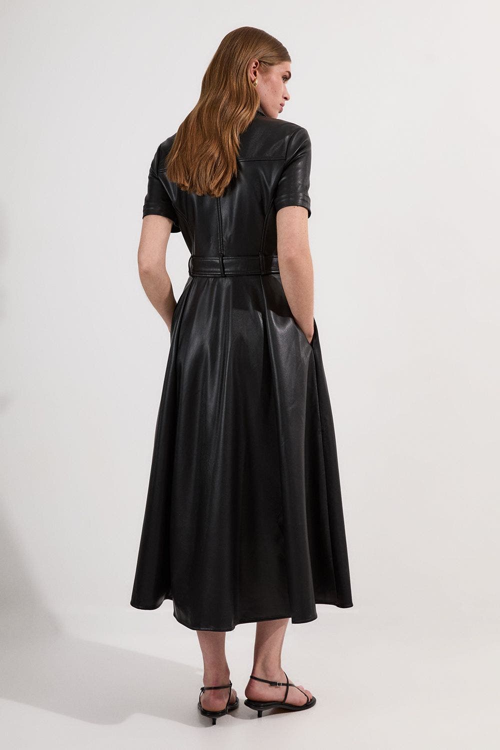 faux leather shirt dress 100% polyester Dry clean Imported SIZE Jennifer Faux Leather Dress -