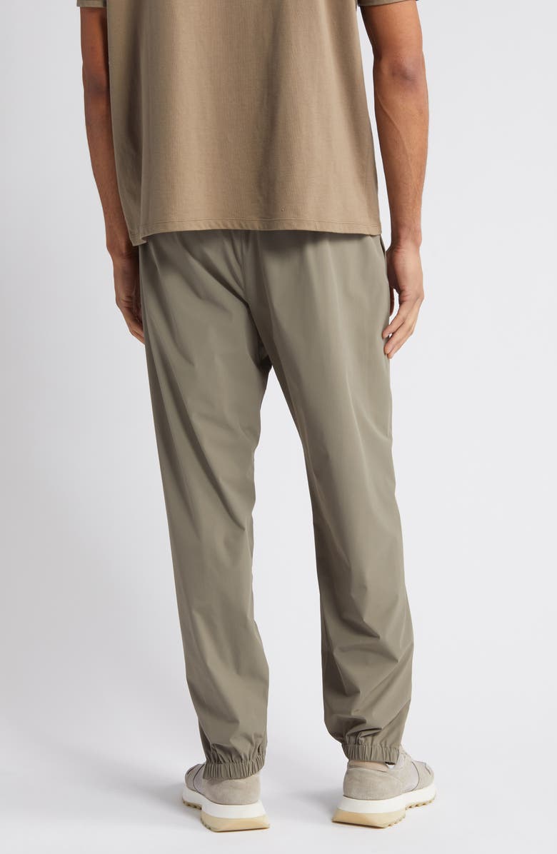 Fear of God Essentials Stretch Nylon Track Pants, Alternate, color, 