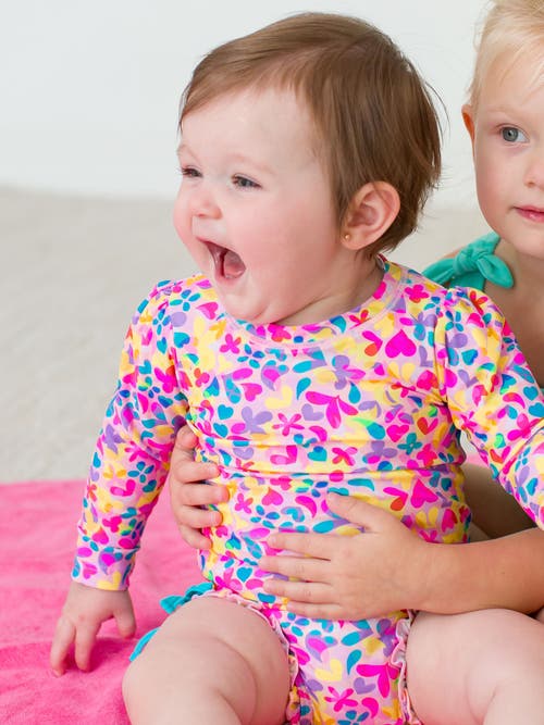 Rufflebutts Baby Girls Long Sleeve Upf50+ One Piece Rash Guard In Vibrant Neon