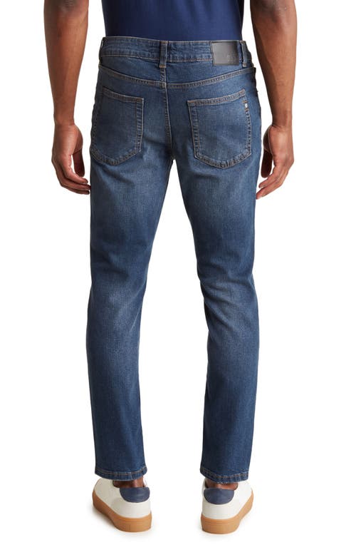 Shop Dkny Sportswear Mercer Skinny Jeans In Hawaiian Ocean