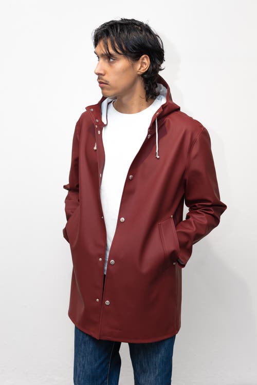 Stutterheim Stockholm Long Sleeve Hooded Raincoat In Red