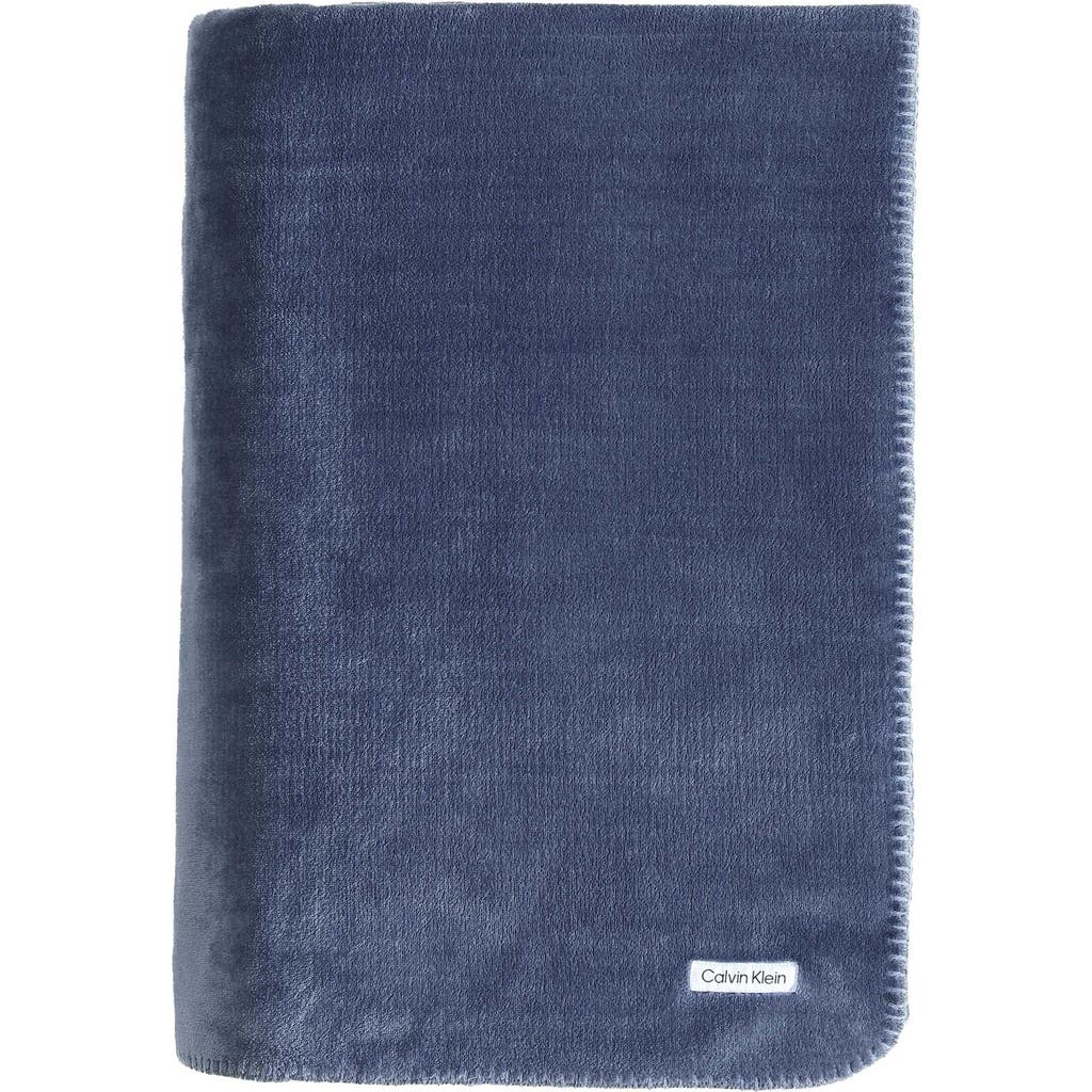 CALVIN KLEIN HOME CALVIN KLEIN HOME MODERN REVERSIBLE SOLID PLUSH BLANKET