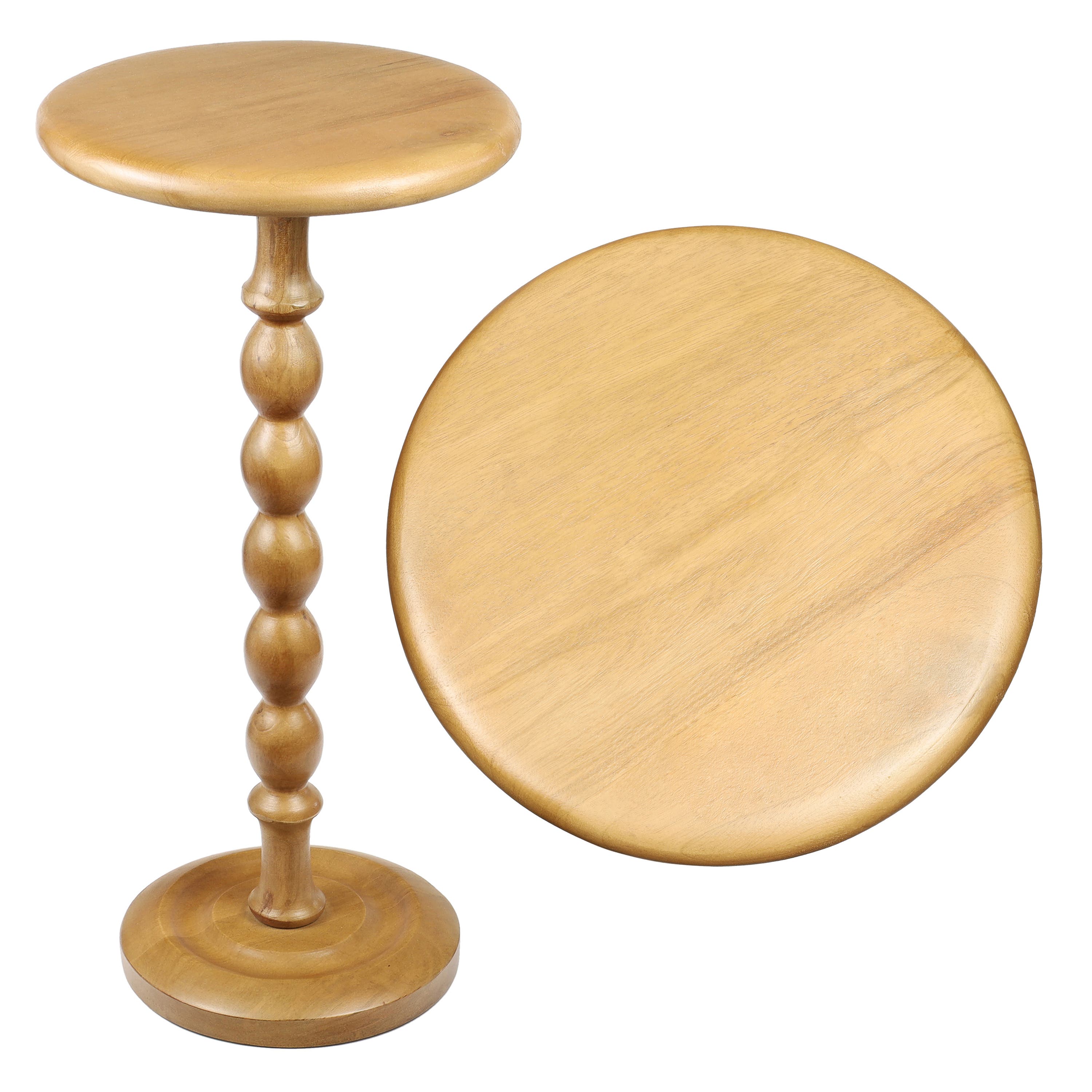 Light brown wooden stool with round seat and beaded stem