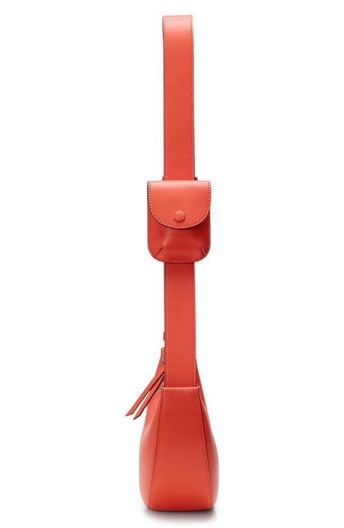 Oryany Rookie Crescent Leather Crossbody Bag In Orange