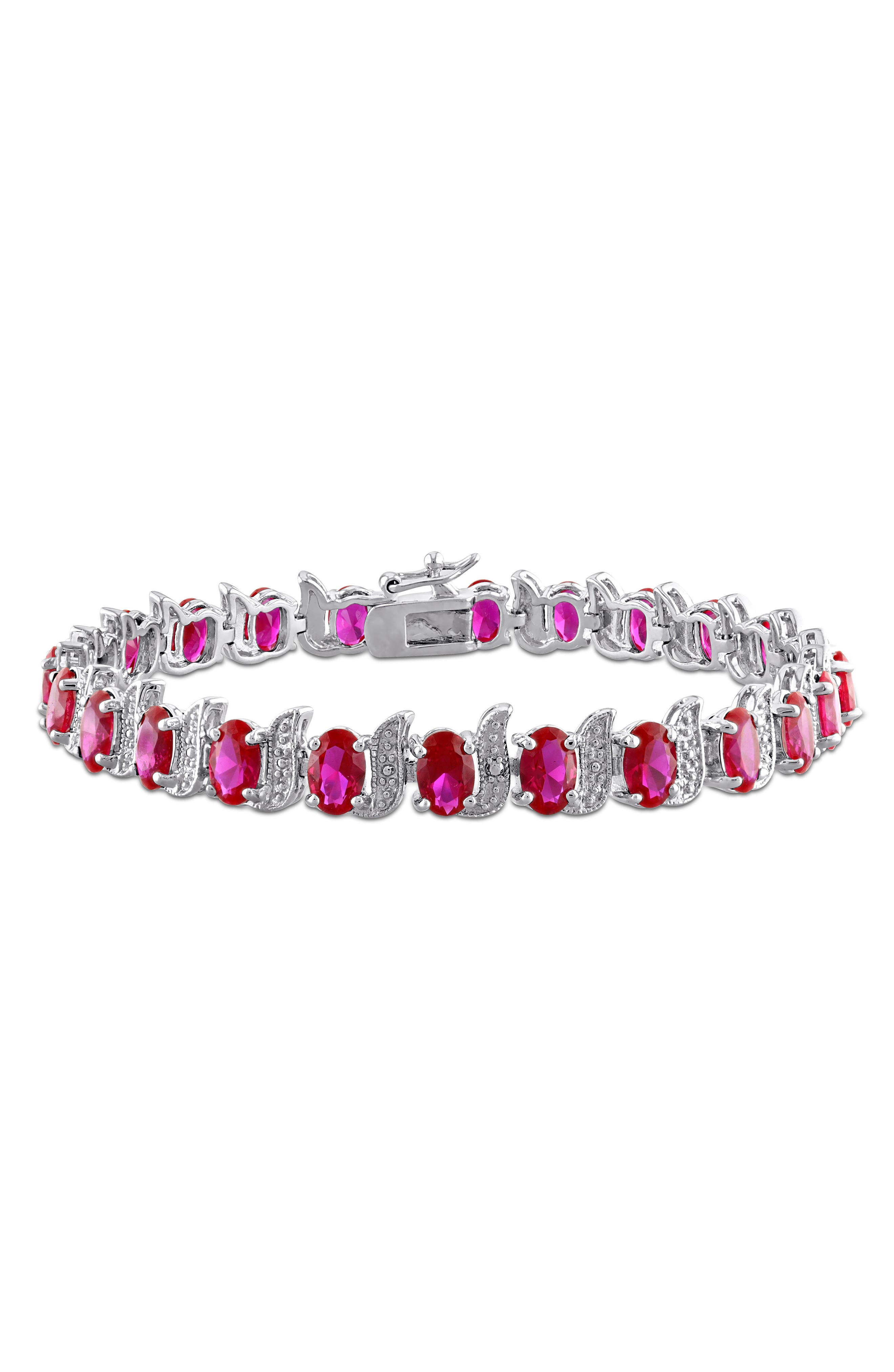 DELMAR Oval Cut Created Ruby Tennis Bracelet