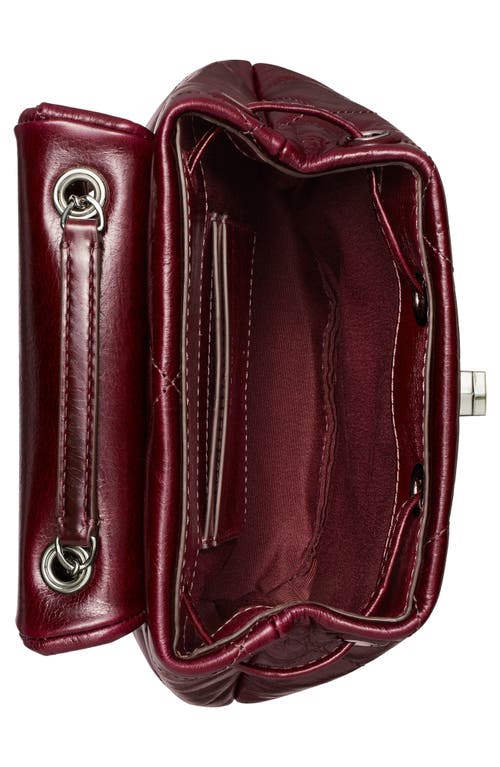 Tory Burch Kira Distressed Diamond Quilted Leather Backpack In Red