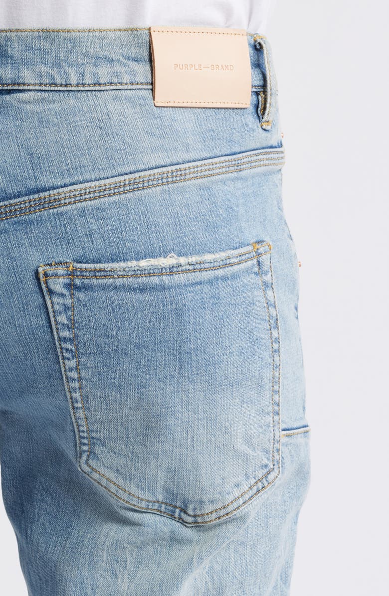 Ripped Knee Blowout Slim Jeans