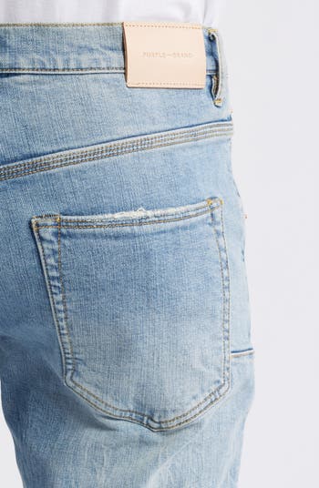 Ripped Knee Blowout Slim Jeans
