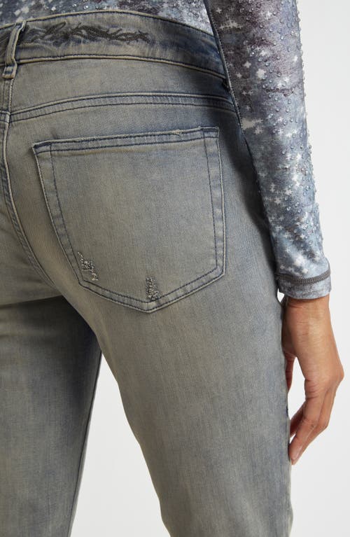 DIESEL DIESEL® 1969 D-EBBEY LOW RISE DISTRESSED BOOTCUT JEANS
