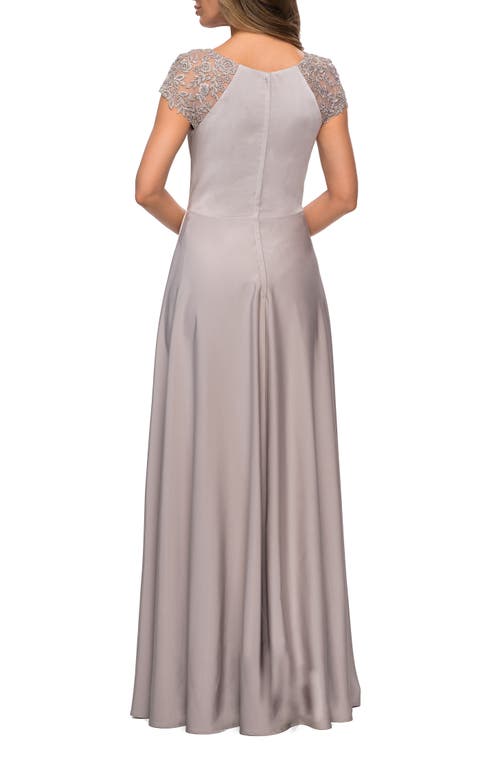 La Femme Long Satin Dress With Sheer Floral Lace Cap Sleeves In Silver