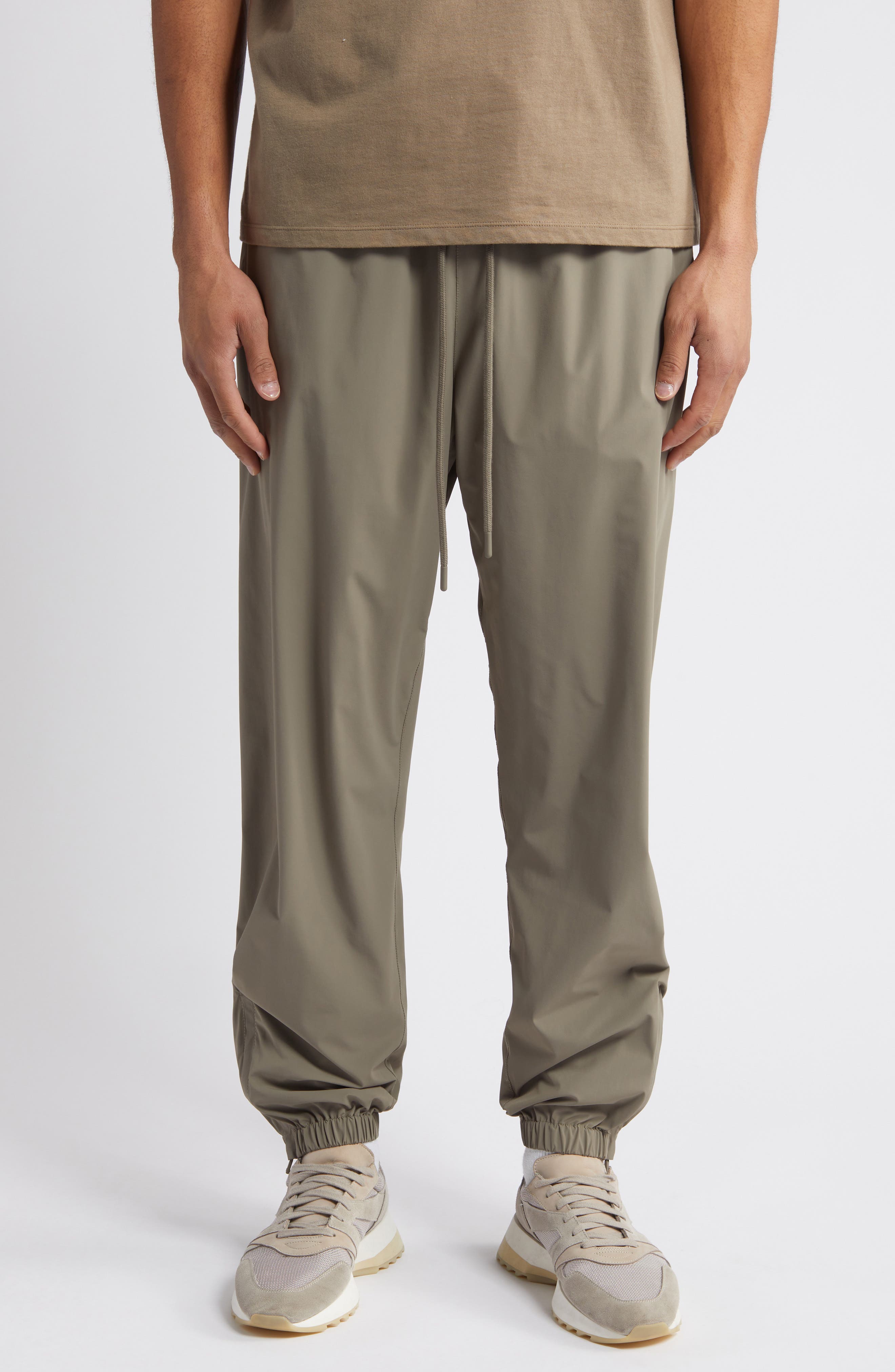 Fear of God Essentials Stretch Nylon Track Pants | Nordstrom