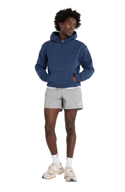 NEW BALANCE NEW BALANCE ATHLETICS WOVEN STRETCH NYLON SHORTS