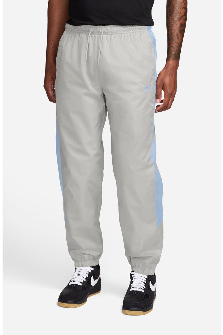 Windrunner Water Repellent Track Pants, Main, color, VAST GREY/ HYDROGEN BLUE