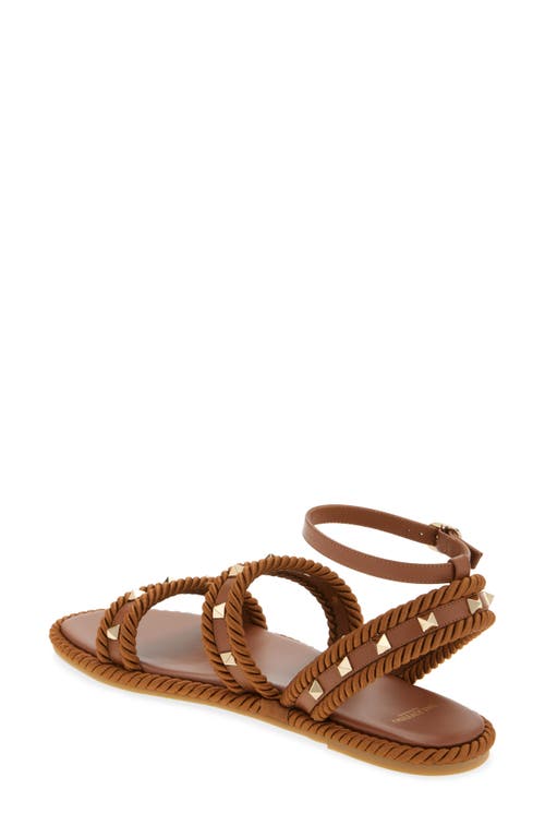 Valentino Garavani Rockstud Ankle Strap Flat Sandal In Tabacco