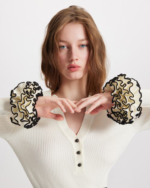 Theo The Label Nomia Ruffle Sleeve Johnny Sweater In White