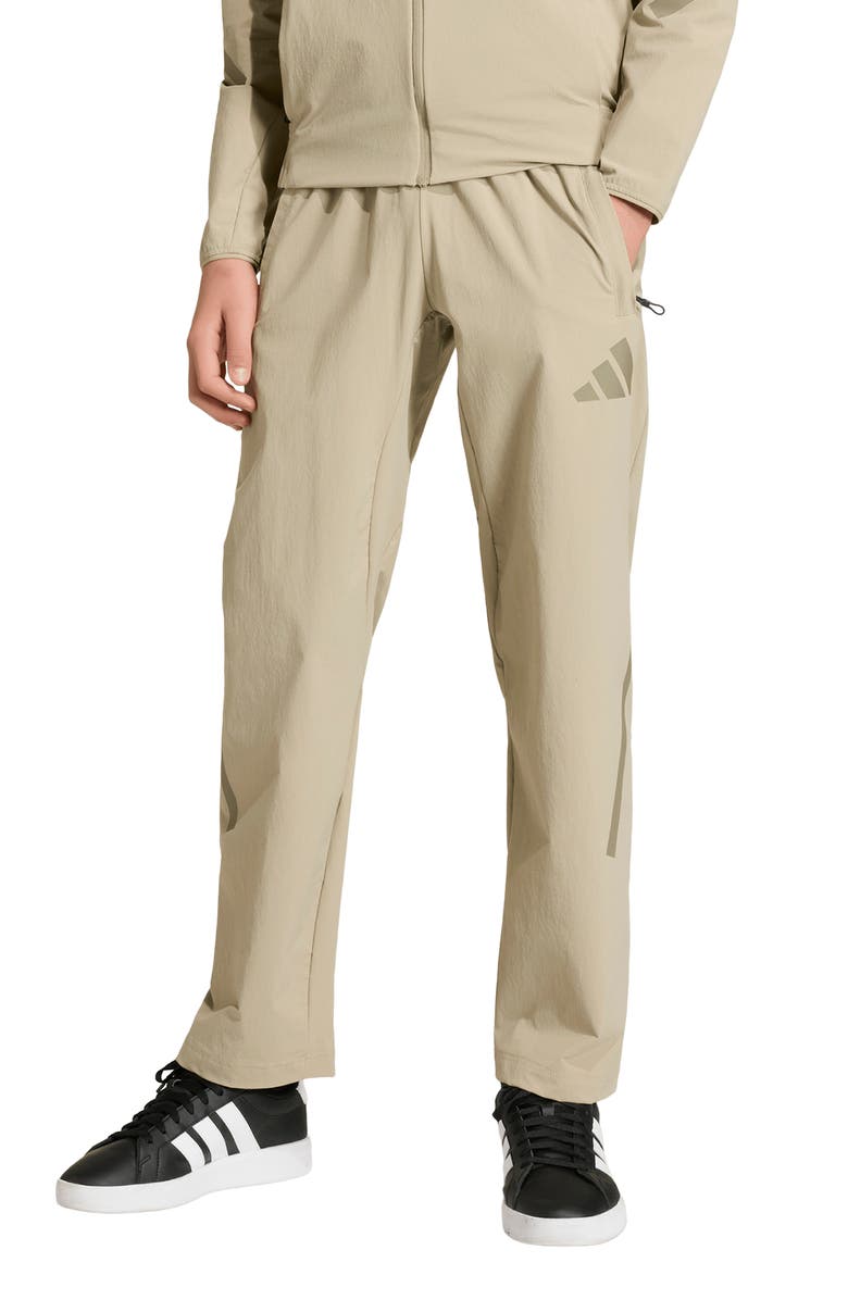 adidas Originals Kids' Z.N.E. Woven Travel Pants, Alternate, color, Wonder Cargo/ Clay