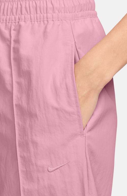 Nike Sportswear Everything Wovens Mid-rise Open-hem Pants In Elemental Pink/elemental Pink