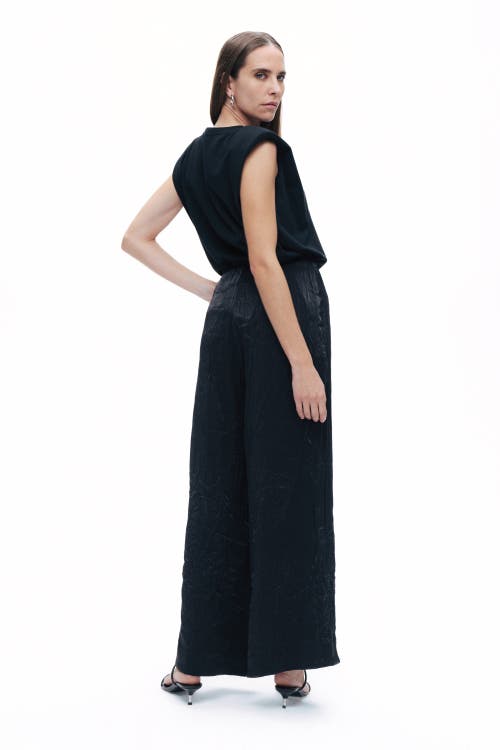 Shop Nocturne Wrinkled Wide-leg Pants In Black