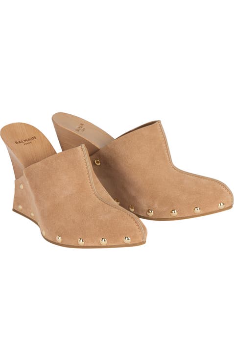 Wedge clogs in wood and suede