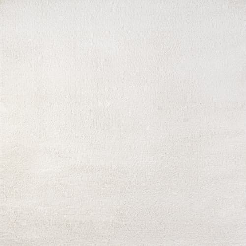 Shop Jonathan Y Haze Solid Low-pile Area Rug In Beige/ecru